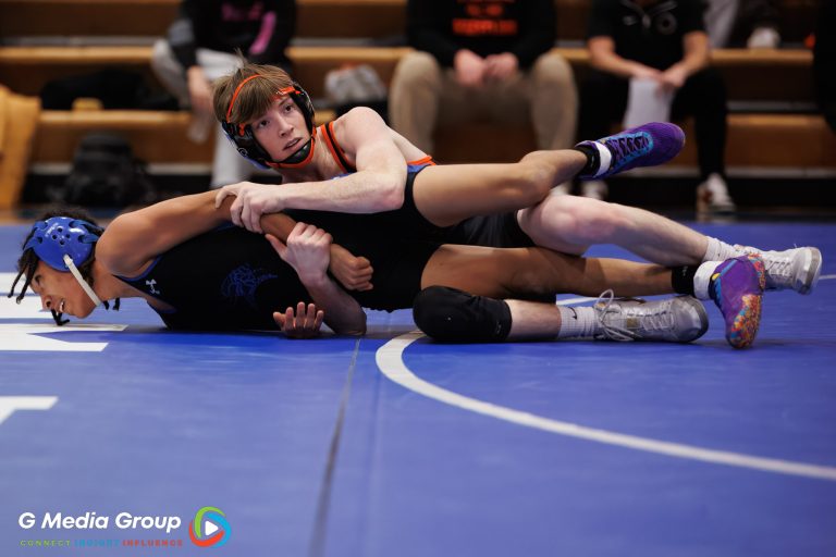 Declan Sons (East) Wrestles Geneva's Dontre McClose during his match on Jan 14, 2025 at Geneva Highschool.