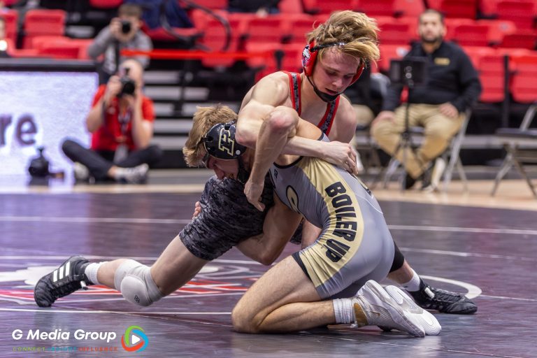 Jacob Brya (NIU) wrestles Cole Solomey (Purdue) during his match Jan 12, 2025