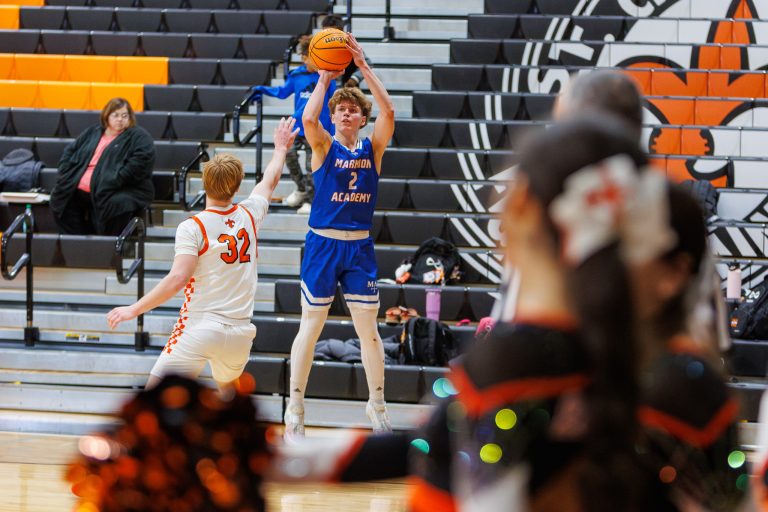 Marmion's Caden Anderson shoots a basket during the game against SCE.