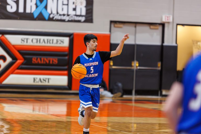 Marmion's Ali Muhammed Tharwani signals to teammates his next play.