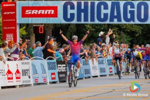 Sam Ritchie of MITOQ - NZ Cycling Project celebrates after winning the Men’s Pro 1/2 race during the final day of the Winfield Criterium and Summerfest, Sunday, July 20, 2025, in Winfield, Ill.
