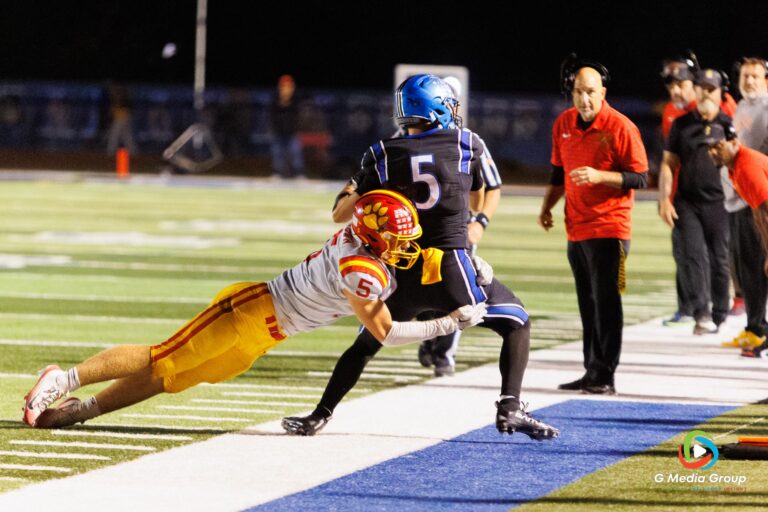 Batavia Junior Jack Brown attempting to take down St. Charles North Senior Braden Harms during the SCN vs Batavia High School Varsity football game on Friday September 26, 2025 at SCN. | Photo Credit: Zachary Gebis