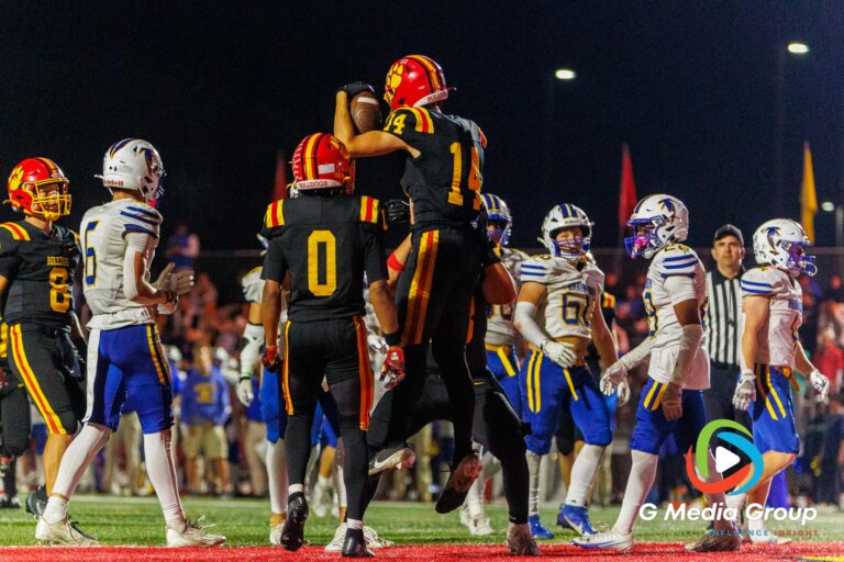 Batavia's Jr Brennon Zeng #14 celebrates after a touchdown during the Batavia vs Wheaton North football game at Batavia Highschool on Oct 10, 2025. | Photo Credit: Zachary Gebis