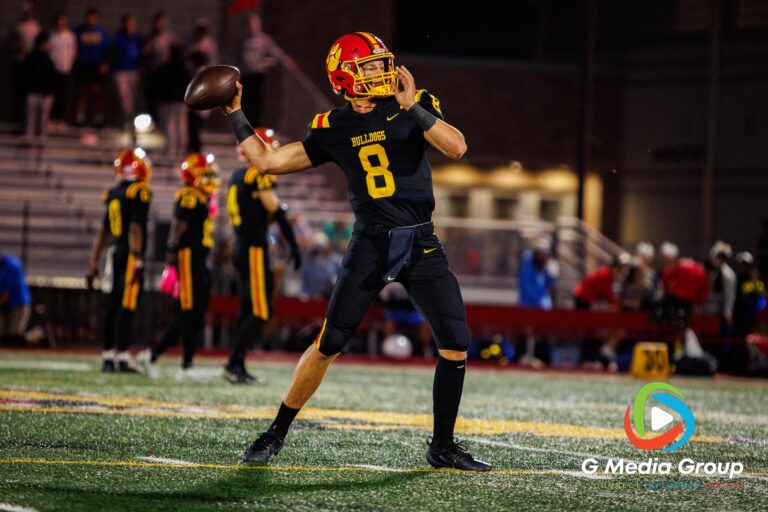 Batavia's Quarterback Michael Vander Luitgaren practicing throws before the Batavia vs Wheaton North football game at Batavia Highschool on Oct 10, 2025. | Photo Credit: Zachary Gebis