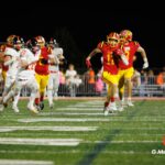 Batavia wide receiver Brett Berggren (#11) runs to complete his momentum-shifting 80-yard touchdown run during the DuKane Conference game on Friday, Oct. 17, 2025, in Batavia, Illinois. The touchdown was a key moment in the Bulldogs' 31-13 victory on Senior Night. (Photo Credit: Zachary Gebis)