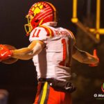 Batavia's #11 Brett Berggren (senior) celebrates after scoring the first touchdown against Wheaton Warrenville South during Friday night's DuKane Conference game. Batavia defeated Wheaton Warrenville South 45-12.