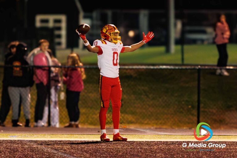 Batavia's Darin Ashiru (#0) raises his arms in celebration after scoring a touchdown in the fourth quarter against Wheaton Warrenville South. Batavia won the DuKane Conference game 45-12. | Photo Credit: Zachary Gebis