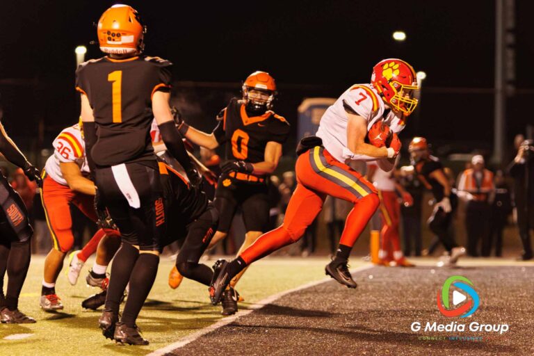Batavia running back Charlie Rosengren (#7) scores a touchdown in the third quarter against Wheaton Warrenville South. Batavia secured a 45-12 victory in the DuKane Conference matchup. | Photo Credit: Zachary Gebis