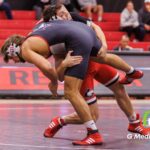 Spencer Mooberry (Red) battles Nathan Elstner (Black) in the 197-pound weight class at the NIU wrestle-offs. Mooberry won by Technical Fall (20-2). | Photo Credit: Zachary Gebis