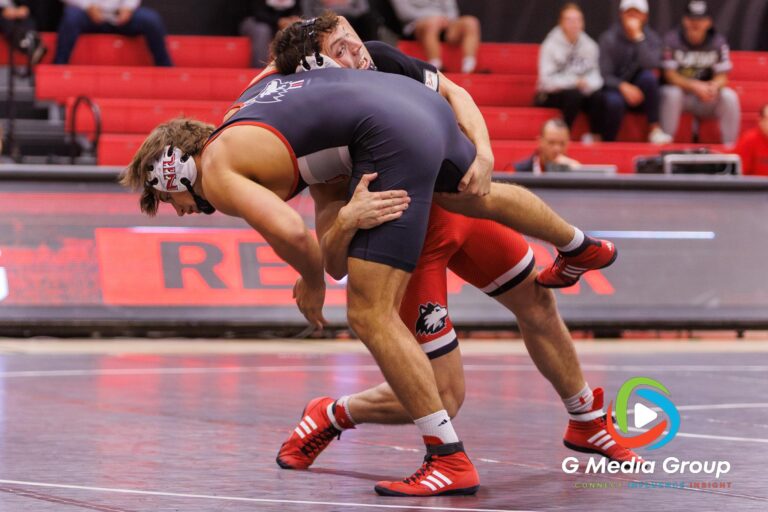 Spencer Mooberry (Red) battles Nathan Elstner (Black) in the 197-pound weight class at the NIU wrestle-offs. Mooberry won by Technical Fall (20-2). | Photo Credit: Zachary Gebis