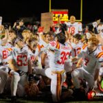 Batavia players celebrate after winning the IHSA Class 7A Football Playoffs Second Round Game 19 against Glenbard East on Friday, Nov. 7, 2025, in Lombard, IL. | Photo: Zachary Gebis