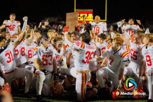 Batavia players celebrate after winning the IHSA Class 7A Football Playoffs Second Round Game 19 against Glenbard East on Friday, Nov. 7, 2025, in Lombard, IL. | Photo: Zachary Gebis