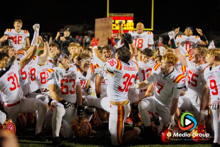 Batavia players celebrate after winning the IHSA Class 7A Football Playoffs Second Round Game 19 against Glenbard East on Friday, Nov. 7, 2025, in Lombard, IL. | Photo: Zachary Gebis