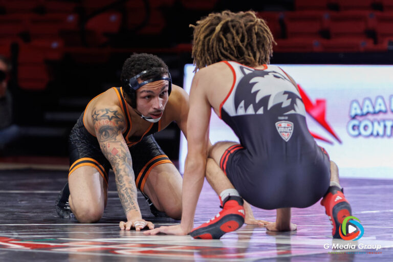 Oregon State Wrestler CJ Hamblin faces off against NIU Landen Johnson during a match at NIU in DeKalb on December 19, 2025. Hamblin won by decision 5-2. (Photo: Zachary Gebis)