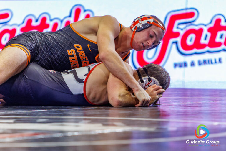 Oregon State Wrestler Daschle Lamer (top) wrestles NIU's Tommy Bennett on December 19, 2025.