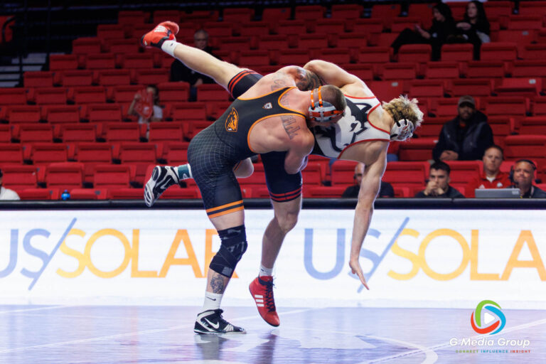 TJ McDonnell attempts a takedown against NIU's Caleb Roe during a match at NIU in DeKalb, IL on December 19, 2025.