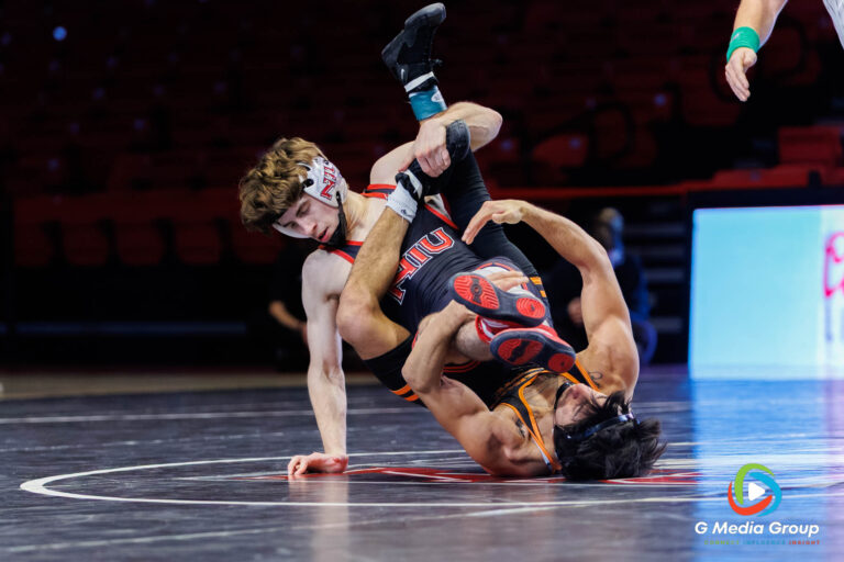Blake WEST of NIU battles against Maximo RENTERIA of Oregon State during their 125-pound bout in DeKalb, Illinois, on December 19, 2025.