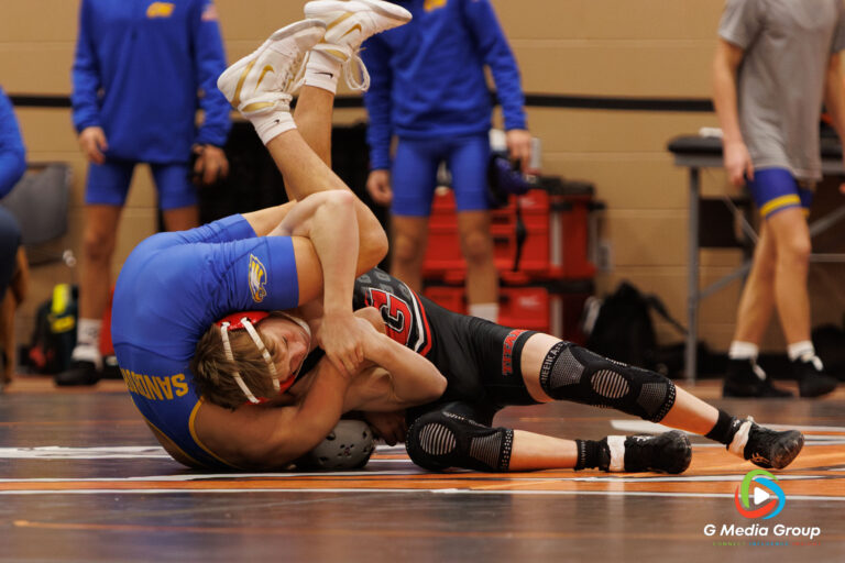 Cooper Clarke of Glenwood wrestles Anthony Hayes of Sandburg day 2 of the 2025 Flavin wrestling tournament in DeKalb, IL on December 30, 2025.