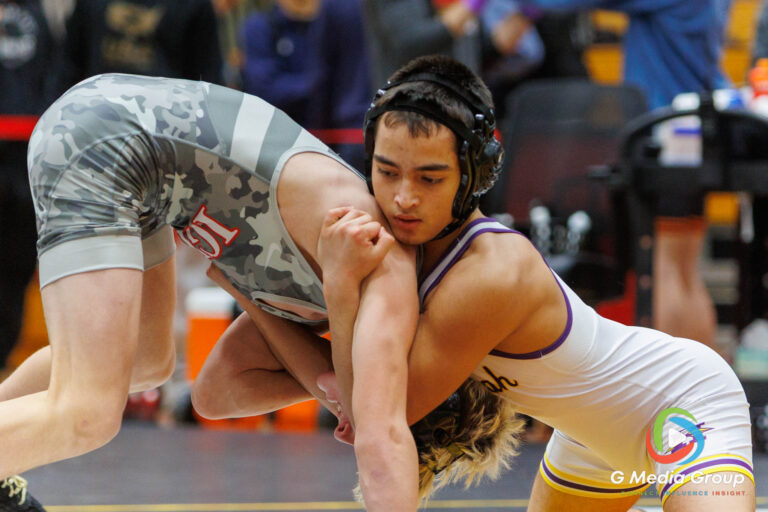 Logan Harris of Rockton Hononegah, right, locks up with Griffin Wineski of Iowa-Grant/Highland during the 1st Place Match at the Clint Arlis Invite at Batavia High School on Saturday, Jan. 17, 2026. Harris (21-6) won the bout by an 11-5 decision.