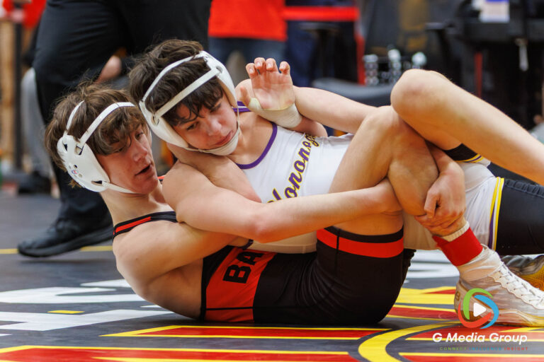 Kai Enos of Batavia, left, works for a turn against Kristian DeClercq of Rockton Hononegah during the 1st Place Match at the Clint Arlis Invite at Batavia High School on Saturday, Jan. 17, 2026. Enos (25-5) captured the individual title on his home mat with a 9-5 decision victory over DeClercq (19-13)