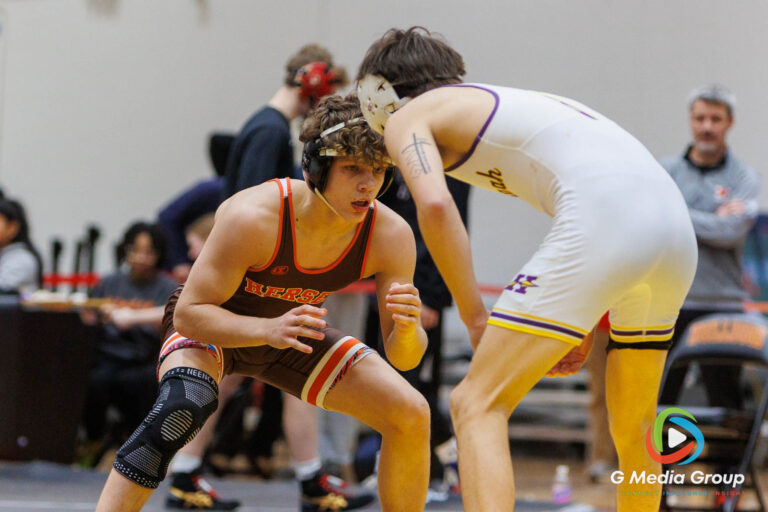 Oleksandr Havrylkiv of Arlington Heights Hersey, left, squares off against Jackson Olson of Rockton Hononegah during the 1st Place Match at the Clint Arlis Invite at Batavia High School on Saturday, Jan. 17, 2026. Havrylkiv (24-2) secured a 6-1 decision victory over Olson (22-8) to claim the individual championship.