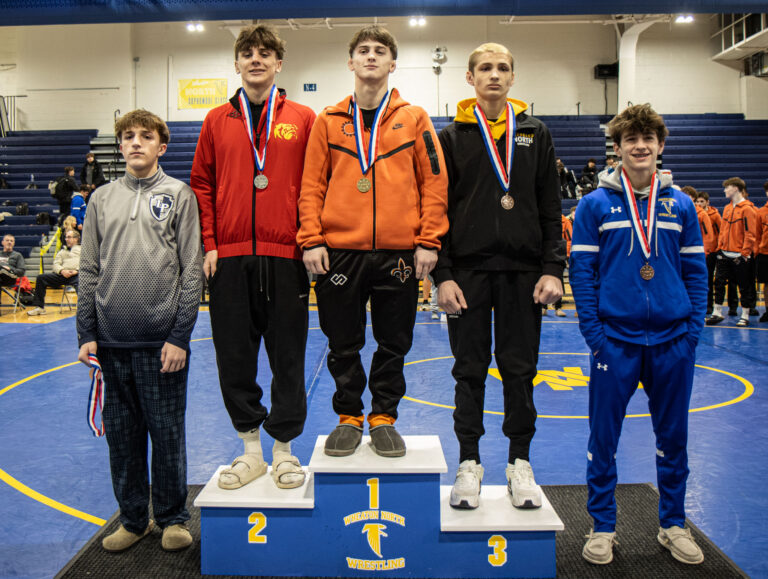 120 lbs Dom Munaretto (St. Charles East), Kai Enos (Batavia), Lukas Thompson (Glenbard North), Liam Lovelace (Lake Park), and Luke Edwards (Wheaton North) stand for photos during the championship round of the DuKane Conference Wrestling Championships held at Wheaton North on January 24, 2026.