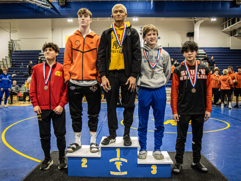 126 lbs Vannak Khiev (Glenbard North), Declan Sons (St. Charles East), Danny Hyde (Wheaton North), Colin Johansen (Batavia), and Matthew Lisowski (Wheaton Warrenville South) pose together during the championship round of the DuKane Conference Wrestling Championships held at Wheaton North on January 24, 2026.