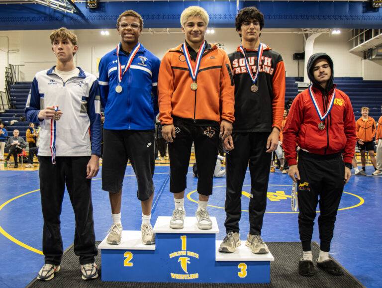 150 lbs Jayden Hernandez (St. Charles East), Jay Doherty (Wheaton North), Daithan Narayanan (Wheaton Warrenville South), Hudson VonQualen (St. Charles North), and Daniel Gonzalez (Batavia) stand during the podium ceremony during the championship round of the DuKane Conference Wrestling Championships held at Wheaton North on January 24, 2026.