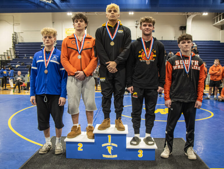 165 lbs Erick Esquivel (Glenbard North), Luciano Litro (St. Charles East), Colin Peyton (Batavia), David Rueth (Geneva), and Reid Adler (Wheaton Warrenville South) are recognized during the championship round of the DuKane Conference Wrestling Championships held at Wheaton North on January 24, 2026.