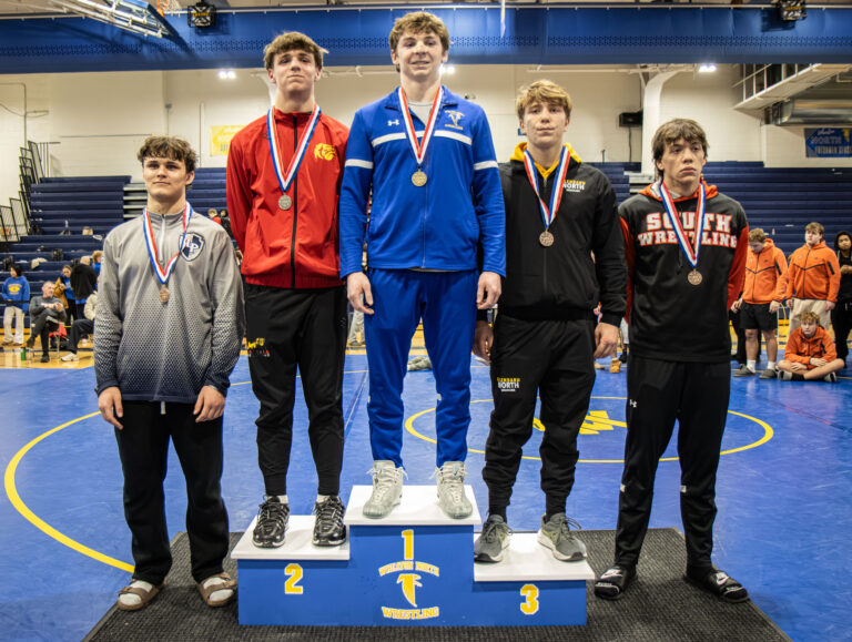 190 lbs Ryan Rosch (Wheaton North), Jack Brown (Batavia), Joseph Fitak (Glenbard North), Alexander Gavrylyuk (Lake Park), and Gregory Heavey (Wheaton Warrenville South) pose for photos during the championship round of the DuKane Conference Wrestling Championships held at Wheaton North on January 24, 2026.