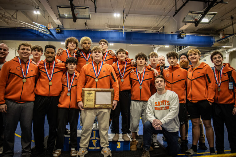 St Charles East's Wrestling team poses for a photo after the championship round of the DuKane Conference Wrestling Championships held at Wheaton North on January 24, 2026. East ended with 295 team points and winners of the 2026 conference.