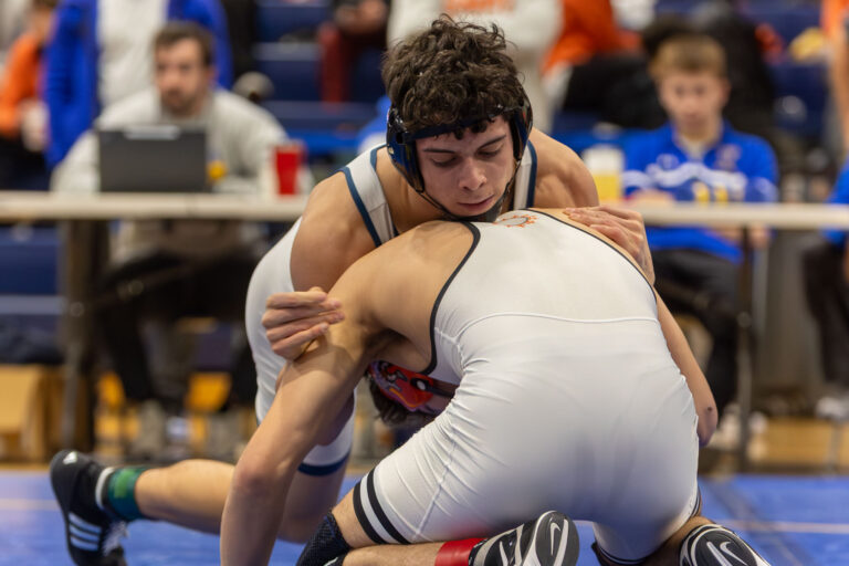 Lake Park's Nicholas Merola wrestles Gavin Woodmancy during the championship round of the DuKane Conference Wrestling Championships held at Wheaton North on January 24, 2026.