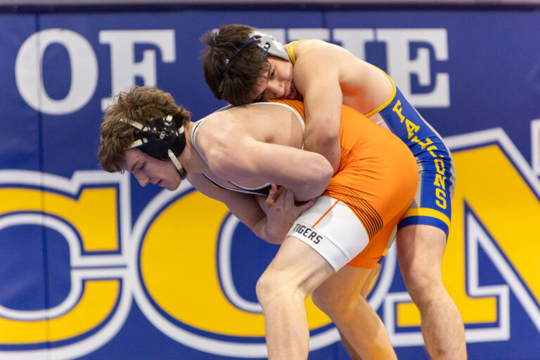 Wheaton North's Jacob Veltri wrestles Wheaton Warrenville South's Reid Adler on mat 3, for 5th place during the DuKane Conference Wrestling Championships held at Wheaton North on January 24, 2026. Adler won by decision 4-0.