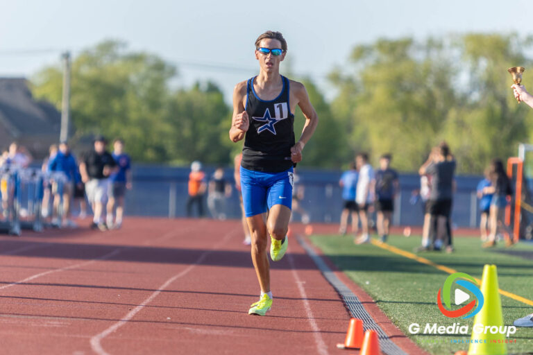 St. Charles North junior Sam Hill crosses the finish line to win the Varsity Boys 1600-meter run at the DuKane Conference Championships on Friday, May 15, 2026.