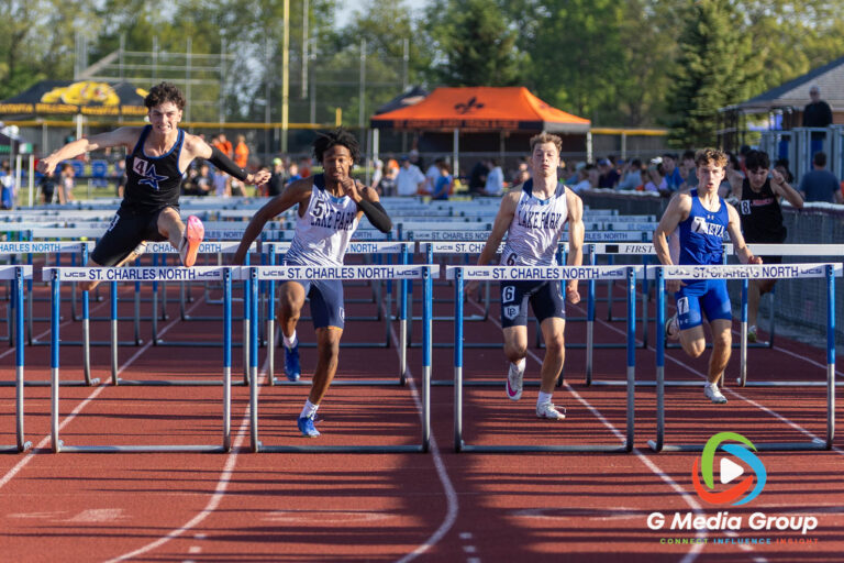 St. Charles North senior Brendan Byrne clears the final hurdle en route to winning the Varsity Boys 110-meter hurdles at the DuKane Conference Championships on Friday, May 15, 2026. Byrne stopped the clock at 15.16 seconds to secure his first of two individual hurdles titles on the night.