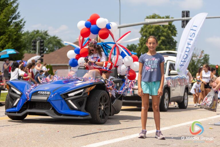 CAROL STREAM, Ill. — July 4, 2026: Participants march down the parade route during the annual Carol Stream Independence Day Parade in Carol Stream, Ill., Saturday, July 4, 2026. Despite a week-long regional heat wave, the community-funded tradition—a village staple since 1987—drew large crowds for the nearly two-hour event, which honored local military veterans as the collective Grand Marshal. (GMedia Group/Zachary Gebis)