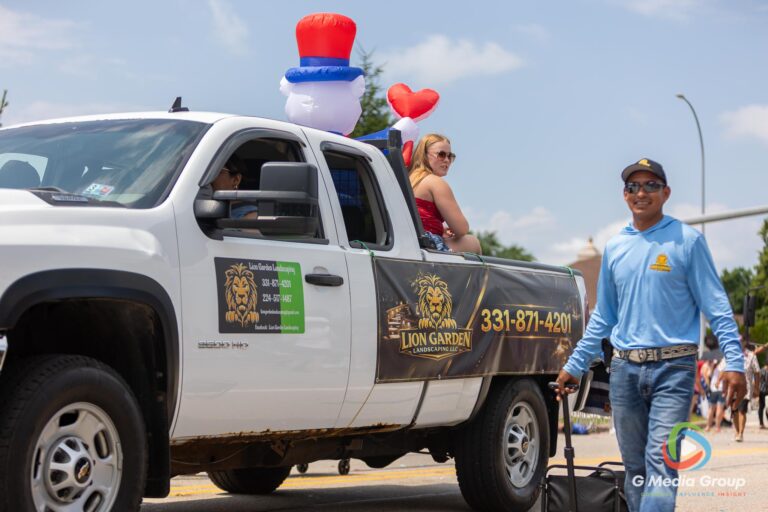 CAROL STREAM, Ill. — July 4, 2026: Participants march down the parade route during the annual Carol Stream Independence Day Parade in Carol Stream, Ill., Saturday, July 4, 2026. Despite a week-long regional heat wave, the community-funded tradition—a village staple since 1987—drew large crowds for the nearly two-hour event, which honored local military veterans as the collective Grand Marshal. (GMedia Group/Zachary Gebis)