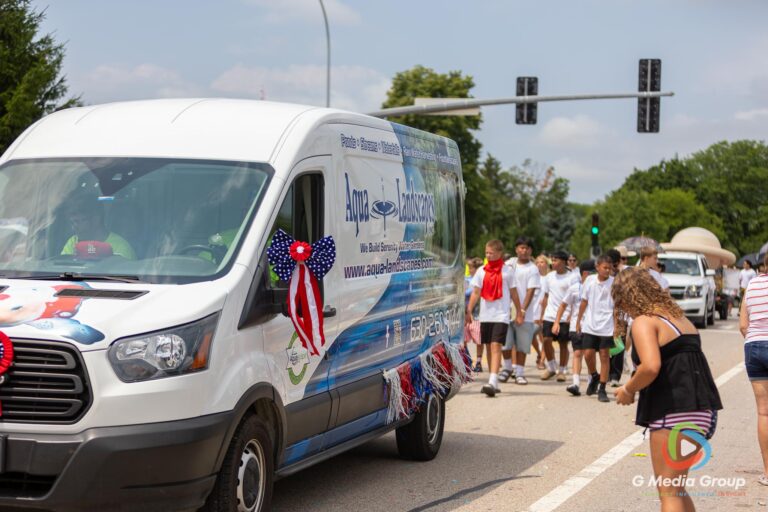 CAROL STREAM, Ill. — July 4, 2026: Participants march down the parade route during the annual Carol Stream Independence Day Parade in Carol Stream, Ill., Saturday, July 4, 2026. Despite a week-long regional heat wave, the community-funded tradition—a village staple since 1987—drew large crowds for the nearly two-hour event, which honored local military veterans as the collective Grand Marshal. (GMedia Group/Zachary Gebis)