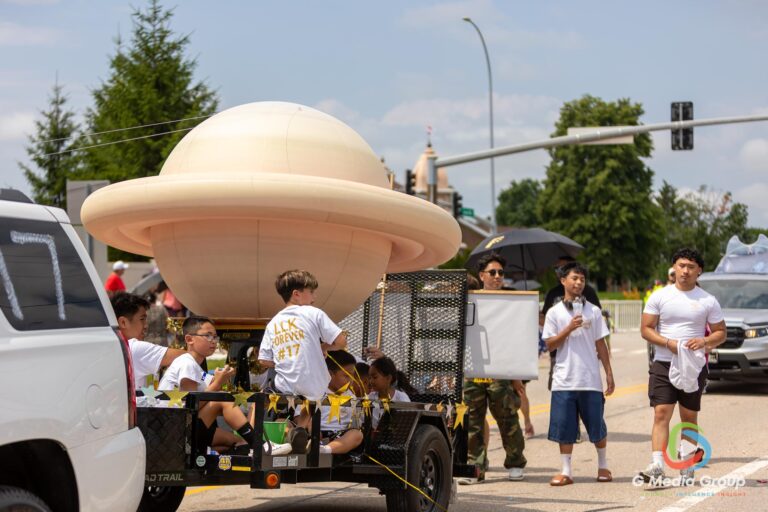 CAROL STREAM, Ill. — July 4, 2026: Participants march down the parade route during the annual Carol Stream Independence Day Parade in Carol Stream, Ill., Saturday, July 4, 2026. Despite a week-long regional heat wave, the community-funded tradition—a village staple since 1987—drew large crowds for the nearly two-hour event, which honored local military veterans as the collective Grand Marshal. (GMedia Group/Zachary Gebis)