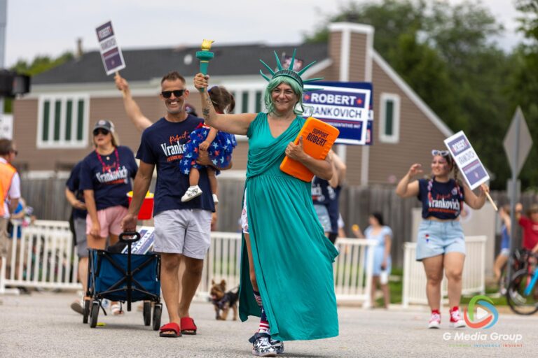 CAROL STREAM, Ill. — July 4, 2026: Participants march down the parade route during the annual Carol Stream Independence Day Parade in Carol Stream, Ill., Saturday, July 4, 2026. Despite a week-long regional heat wave, the community-funded tradition—a village staple since 1987—drew large crowds for the nearly two-hour event, which honored local military veterans as the collective Grand Marshal. (GMedia Group/Zachary Gebis)