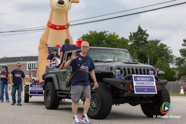 CAROL STREAM, Ill. — July 4, 2026: Participants march down the parade route during the annual Carol Stream Independence Day Parade in Carol Stream, Ill., Saturday, July 4, 2026. Despite a week-long regional heat wave, the community-funded tradition—a village staple since 1987—drew large crowds for the nearly two-hour event, which honored local military veterans as the collective Grand Marshal. (GMedia Group/Zachary Gebis)