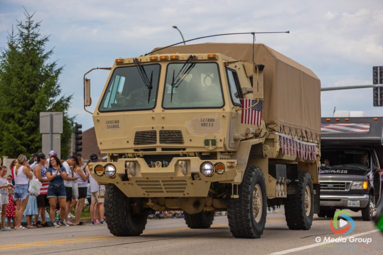 CAROL STREAM, Ill. — July 4, 2026: Participants march down the parade route during the annual Carol Stream Independence Day Parade in Carol Stream, Ill., Saturday, July 4, 2026. Despite a week-long regional heat wave, the community-funded tradition—a village staple since 1987—drew large crowds for the nearly two-hour event, which honored local military veterans as the collective Grand Marshal. (GMedia Group/Zachary Gebis)