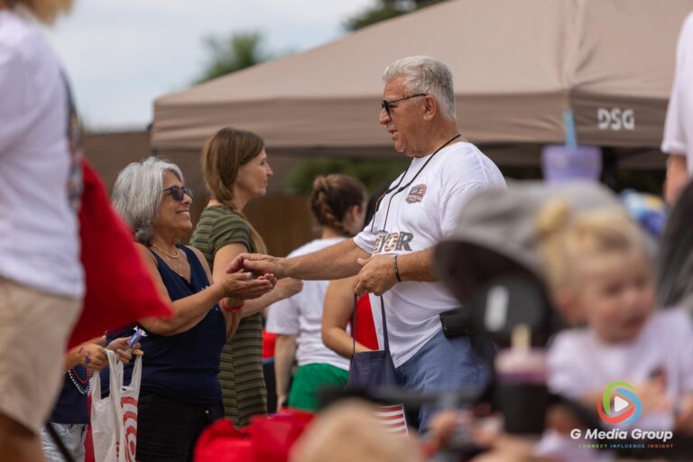 CAROL STREAM, Ill. — July 4, 2026: Participants march down the parade route during the annual Carol Stream Independence Day Parade in Carol Stream, Ill., Saturday, July 4, 2026. Despite a week-long regional heat wave, the community-funded tradition—a village staple since 1987—drew large crowds for the nearly two-hour event, which honored local military veterans as the collective Grand Marshal. (GMedia Group/Zachary Gebis)