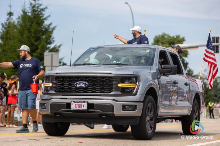 CAROL STREAM, Ill. — July 4, 2026: Participants march down the parade route during the annual Carol Stream Independence Day Parade in Carol Stream, Ill., Saturday, July 4, 2026. Despite a week-long regional heat wave, the community-funded tradition—a village staple since 1987—drew large crowds for the nearly two-hour event, which honored local military veterans as the collective Grand Marshal. (GMedia Group/Zachary Gebis)