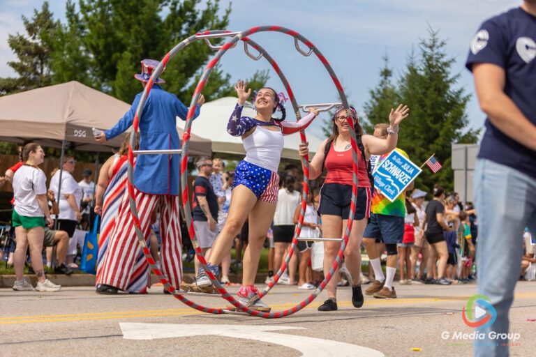 CAROL STREAM, Ill. — July 4, 2026: Participants march down the parade route during the annual Carol Stream Independence Day Parade in Carol Stream, Ill., Saturday, July 4, 2026. Despite a week-long regional heat wave, the community-funded tradition—a village staple since 1987—drew large crowds for the nearly two-hour event, which honored local military veterans as the collective Grand Marshal. (GMedia Group/Zachary Gebis)