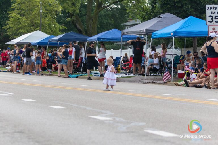 CAROL STREAM, Ill. — July 4, 2026: Participants march down the parade route during the annual Carol Stream Independence Day Parade in Carol Stream, Ill., Saturday, July 4, 2026. Despite a week-long regional heat wave, the community-funded tradition—a village staple since 1987—drew large crowds for the nearly two-hour event, which honored local military veterans as the collective Grand Marshal. (GMedia Group/Zachary Gebis)