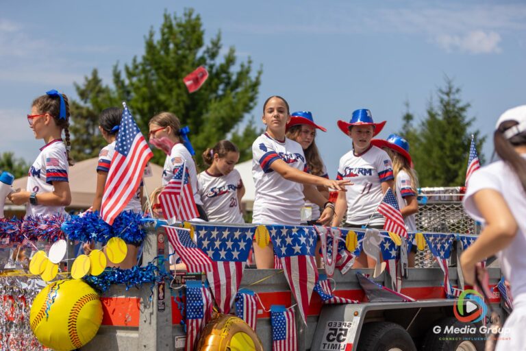 CAROL STREAM, Ill. — July 4, 2026: Participants march down the parade route during the annual Carol Stream Independence Day Parade in Carol Stream, Ill., Saturday, July 4, 2026. Despite a week-long regional heat wave, the community-funded tradition—a village staple since 1987—drew large crowds for the nearly two-hour event, which honored local military veterans as the collective Grand Marshal. (GMedia Group/Zachary Gebis)