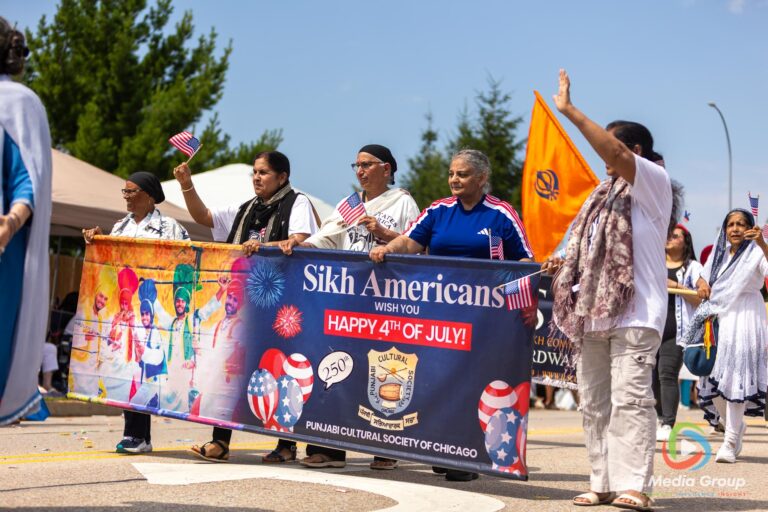 CAROL STREAM, Ill. — July 4, 2026: Participants march down the parade route during the annual Carol Stream Independence Day Parade in Carol Stream, Ill., Saturday, July 4, 2026. Despite a week-long regional heat wave, the community-funded tradition—a village staple since 1987—drew large crowds for the nearly two-hour event, which honored local military veterans as the collective Grand Marshal. (GMedia Group/Zachary Gebis)
