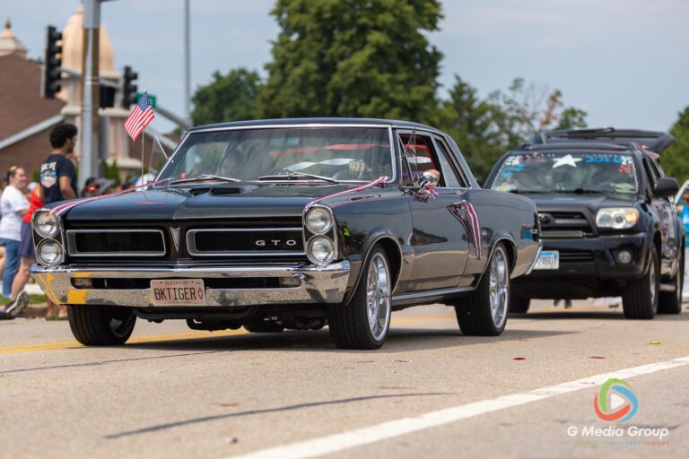 CAROL STREAM, Ill. — July 4, 2026: Participants march down the parade route during the annual Carol Stream Independence Day Parade in Carol Stream, Ill., Saturday, July 4, 2026. Despite a week-long regional heat wave, the community-funded tradition—a village staple since 1987—drew large crowds for the nearly two-hour event, which honored local military veterans as the collective Grand Marshal. (GMedia Group/Zachary Gebis)