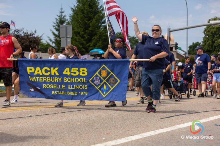 CAROL STREAM, Ill. — July 4, 2026: Participants march down the parade route during the annual Carol Stream Independence Day Parade in Carol Stream, Ill., Saturday, July 4, 2026. Despite a week-long regional heat wave, the community-funded tradition—a village staple since 1987—drew large crowds for the nearly two-hour event, which honored local military veterans as the collective Grand Marshal. (GMedia Group/Zachary Gebis)